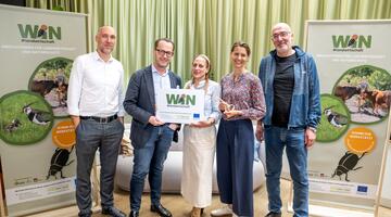 Projektpartner:innen von Projekt WIN #landwirtschaft mit Fotoschild